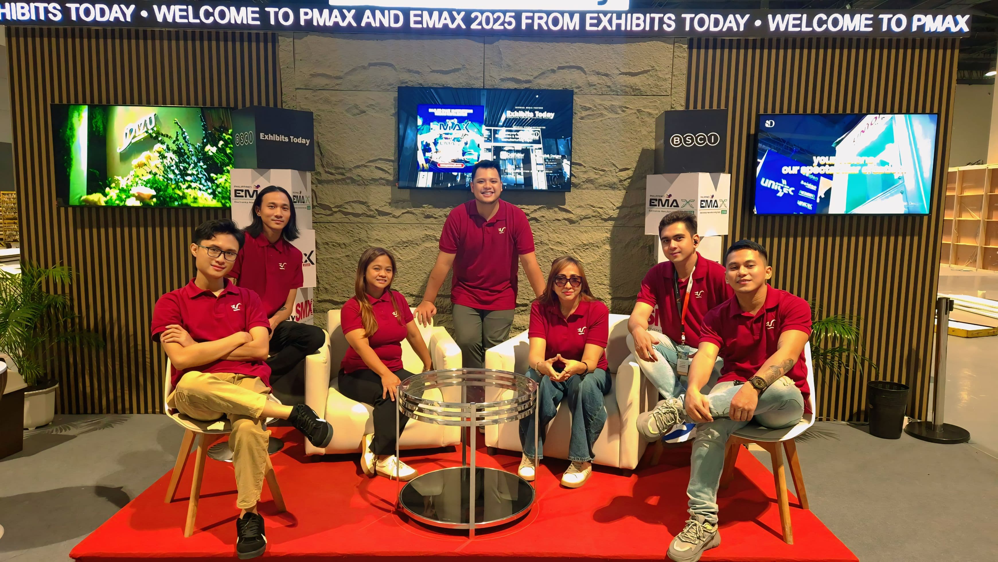 AHA Innovations team in matching maroon polos at the Exhibits Today networking lounge